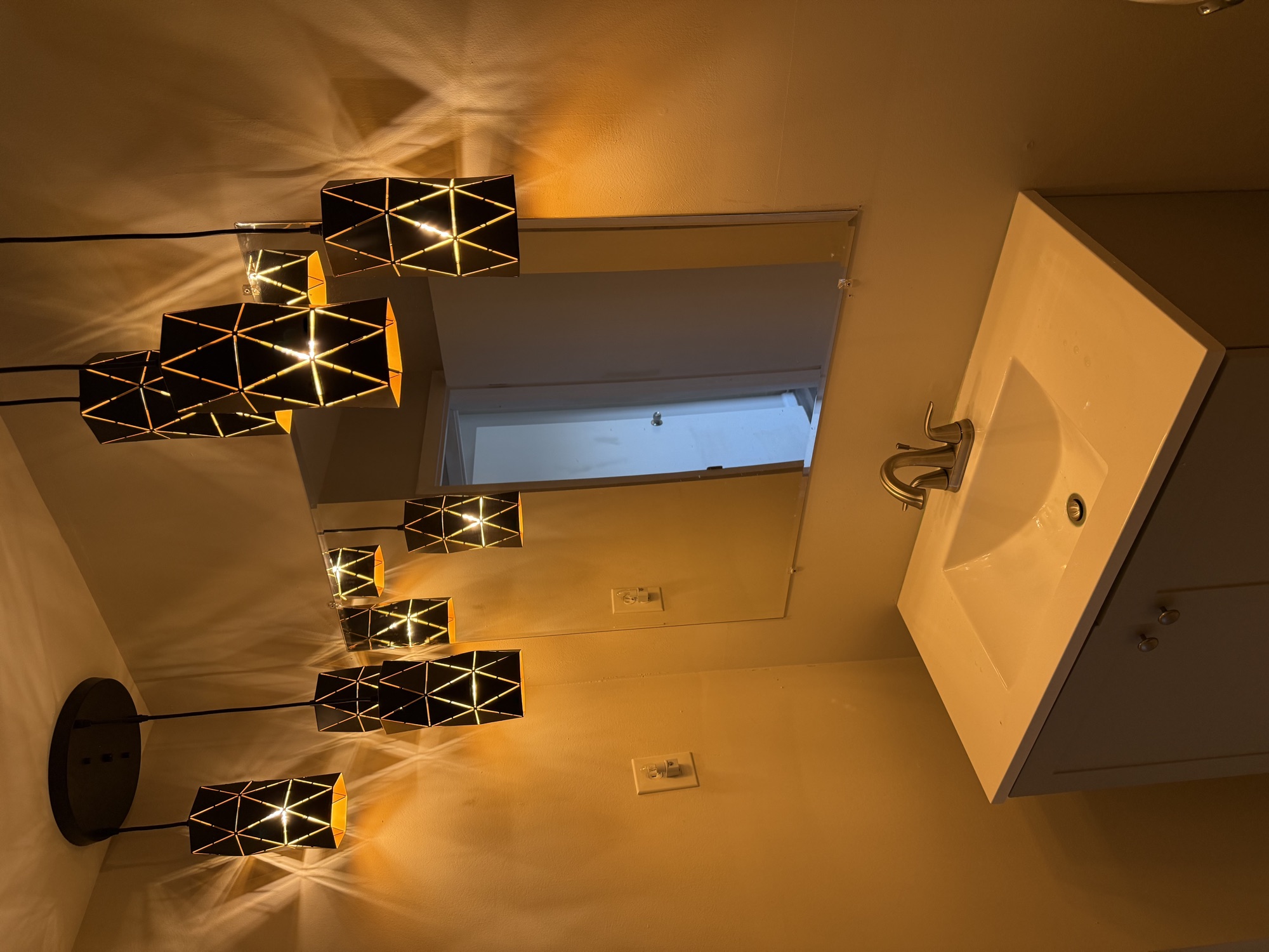 Bathroom with stylish pendant lights