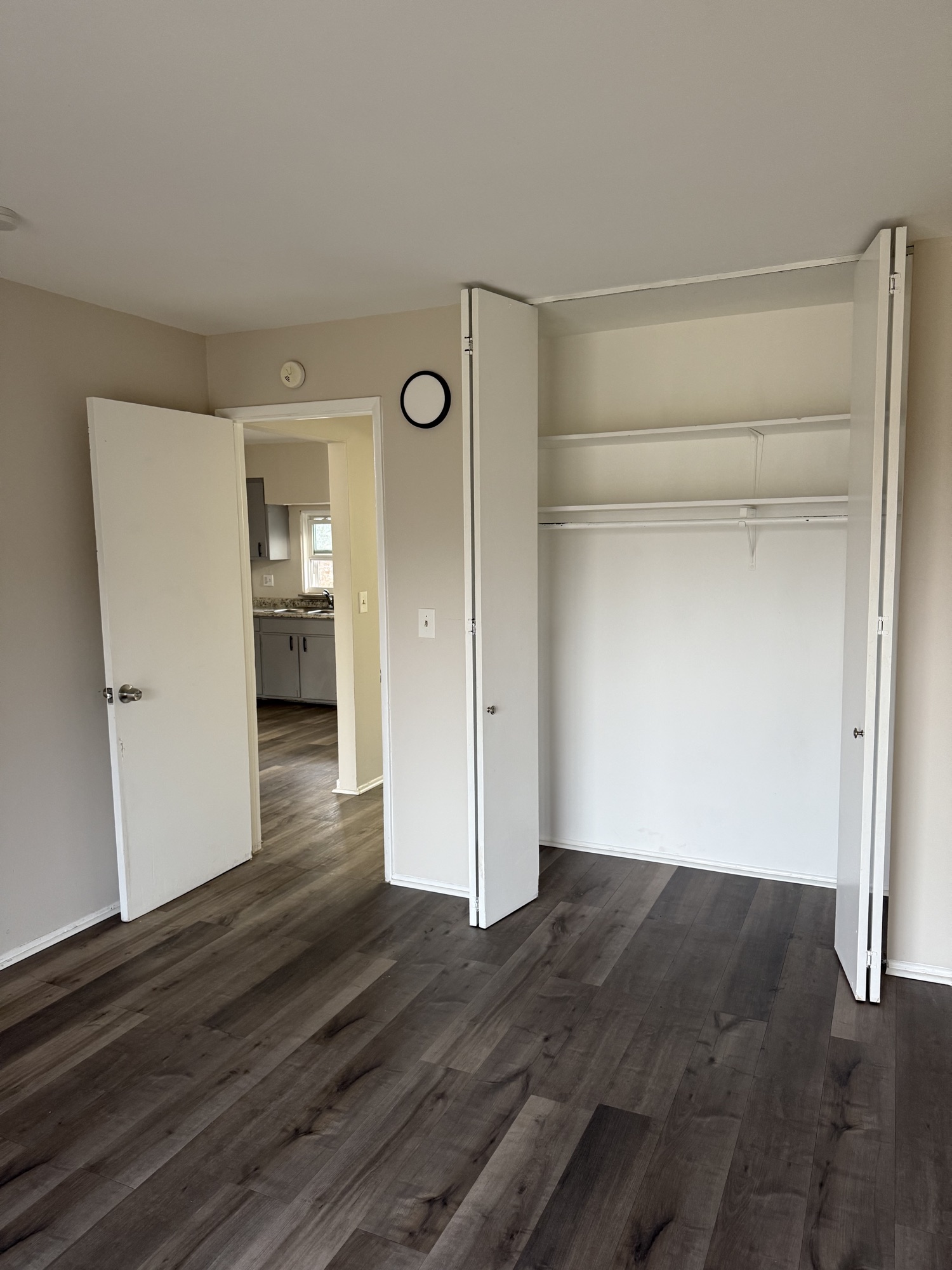 Bedroom with open closet